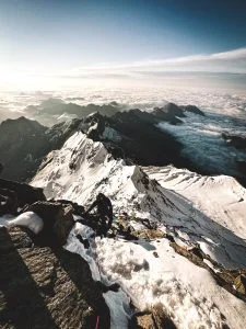 High-altitude panorama of Monte Rosa with glaciers and snowy peaks, perfect for the best mountaineering boots 2025 recommended by UIAGM alpine guides.