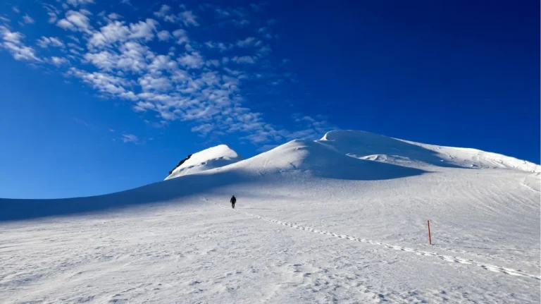 Give the mountains without choosing for the person who will experience them